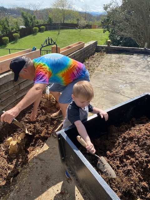 Men digging in the garden